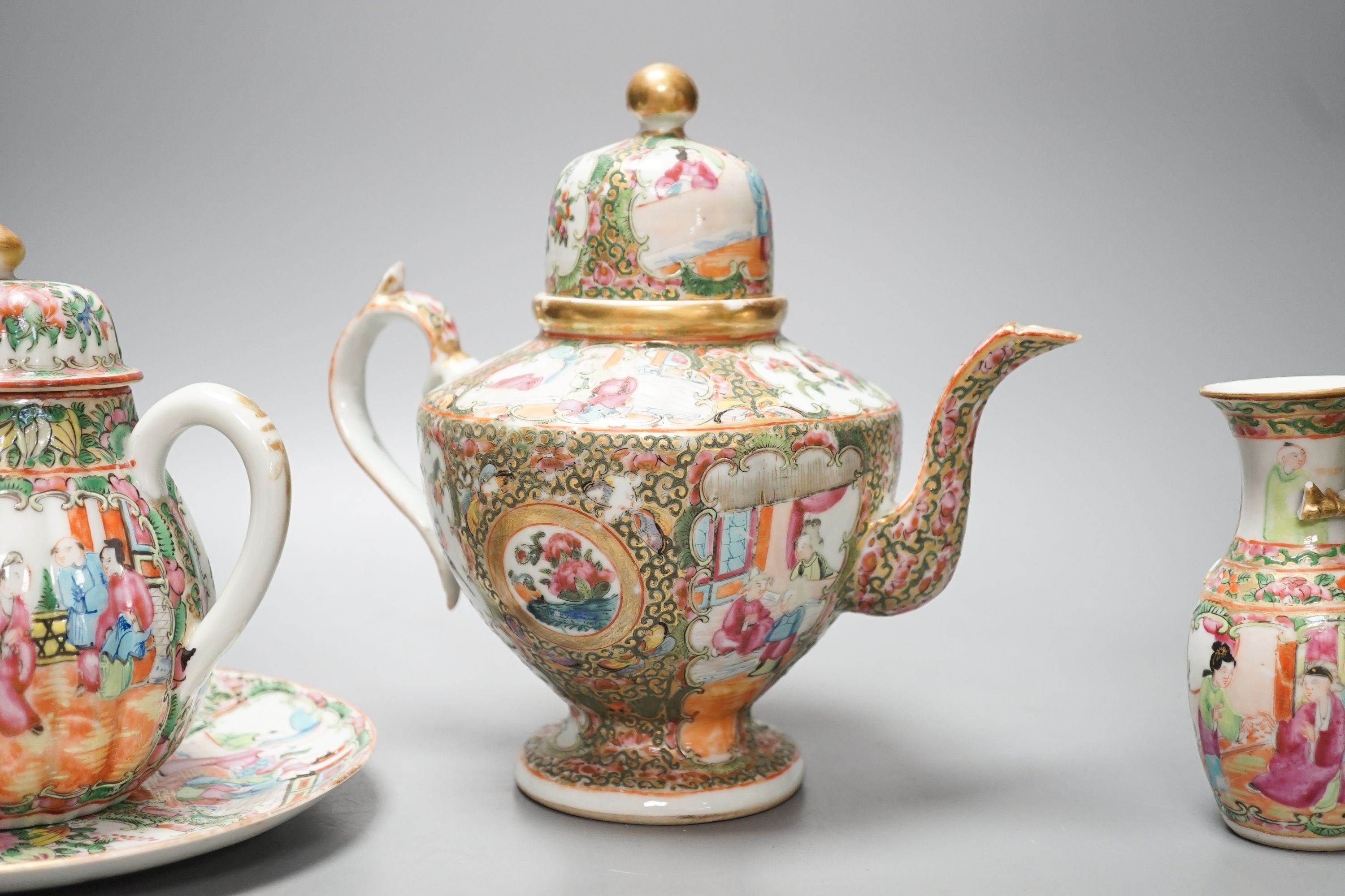 A 19th century Chinese famille rose teapot, sugar bowl, saucer dish vase and a similar yellow ground ‘dragon’ vase and cover 21cm